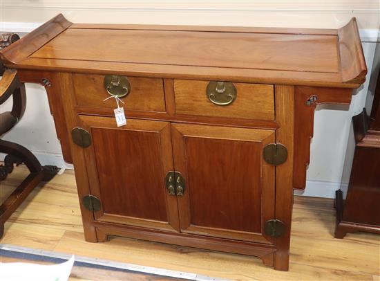 A Chinese padouk wood cabinet W.124cm